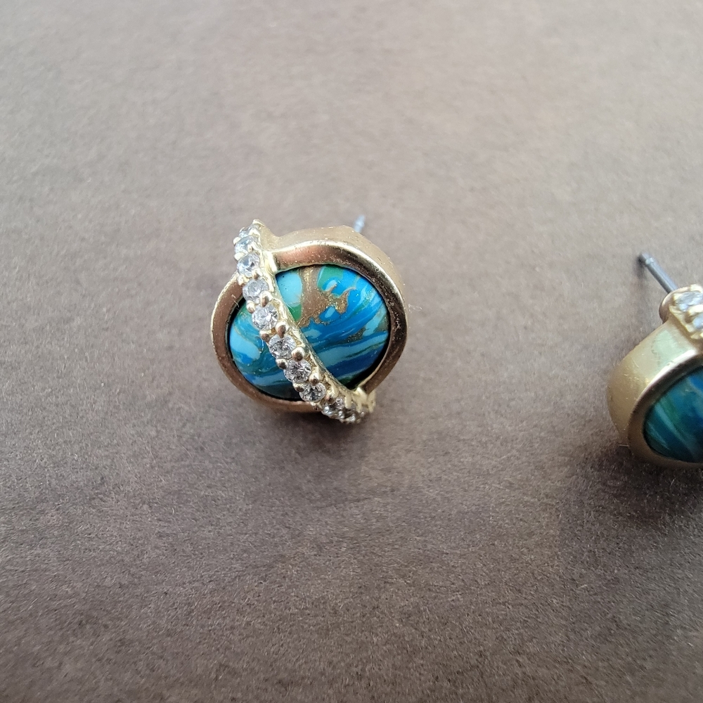 Turquoise with diamond like stone accent studs